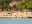 Tourists-and-sea-lions-on-Playa-Mann-San-Cristobal-©-Nigel-Reid